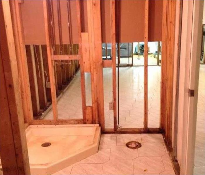 A deconstructed bathroom due to water damage