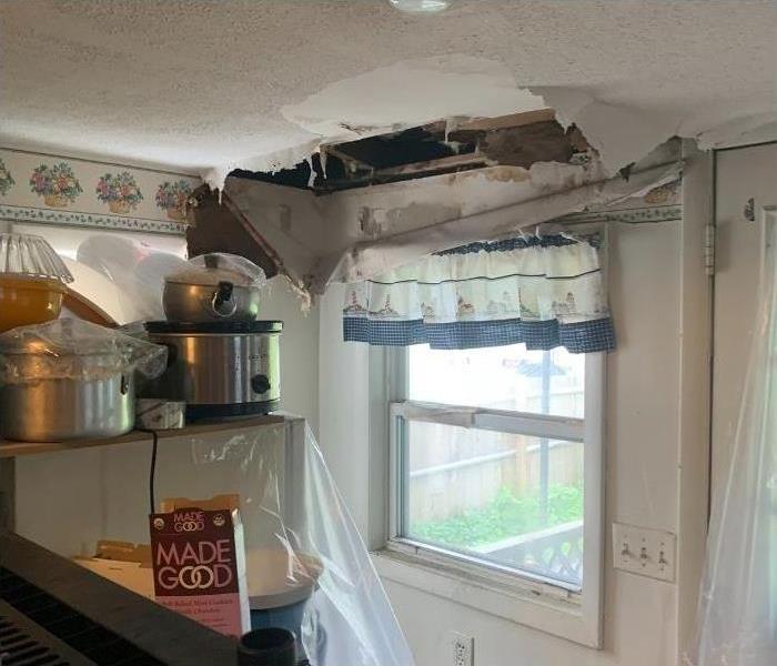 A ceiling collapsed due to water damage in this Albany home. 