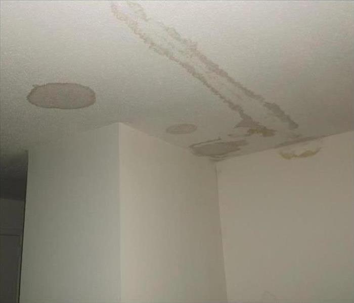 A ceiling with water damage.
