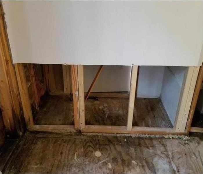 We removed the drywall from the bottom portion of the rooms in your home that experienced water damage.