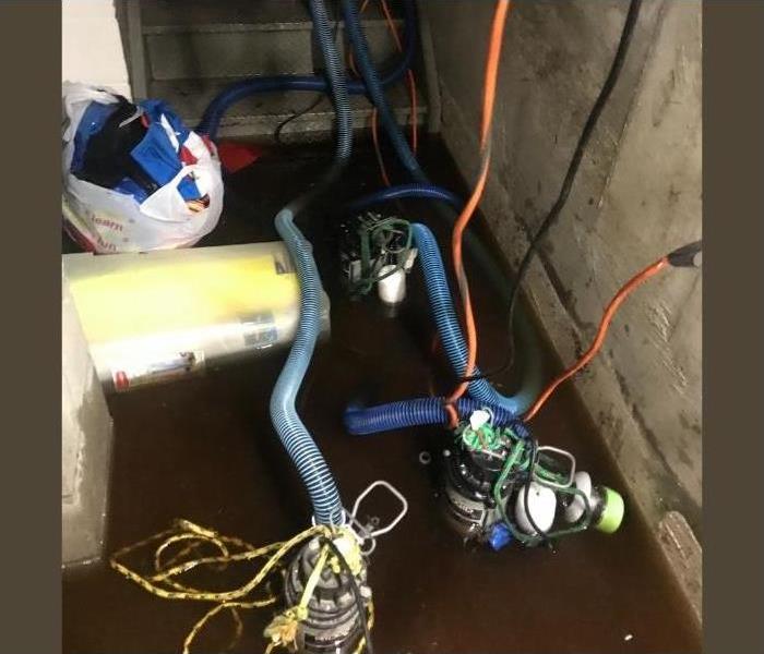 A flooded basement contaminated with black water.